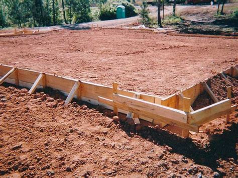 how to build a house pad with skid steer|how to build a house pad.